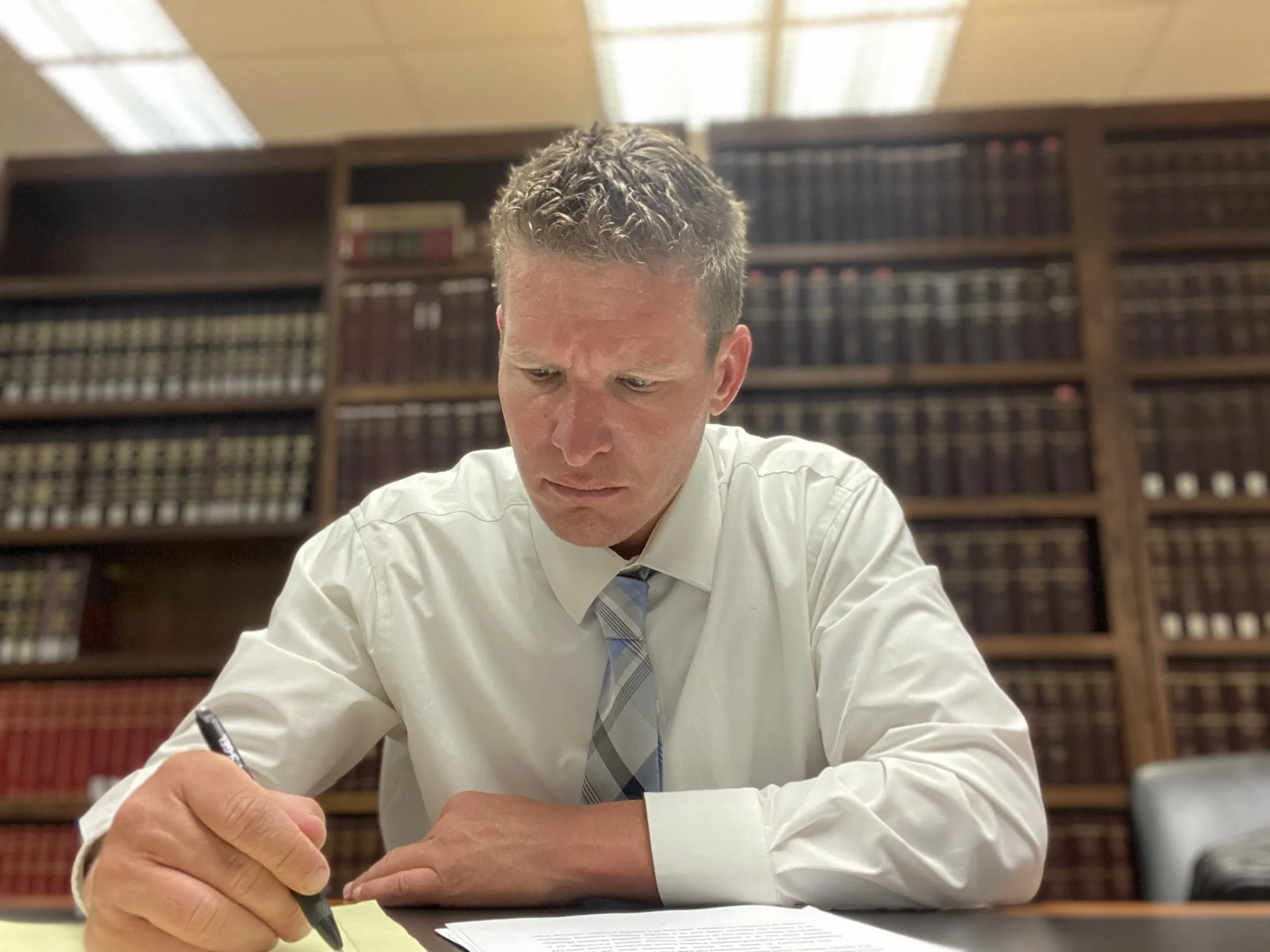 Theodore FitzGerald working in a law library